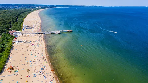 Aerial view of crowded beach on Poland's Baltic Coast (Credit: Getty Images)