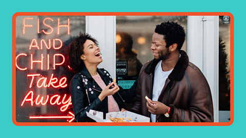 Two adults laughing together