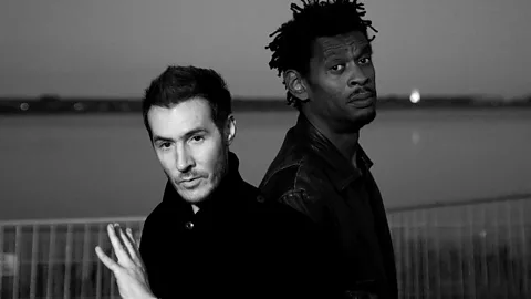 Two members of Massive Attack pose backstage at a festival (Credit: Getty Images)