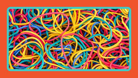 A series of colourful elastic bands looped together.