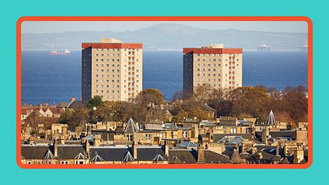 Rows of affluent houses in contrast with tower blocks in Edinburgh in the UK.