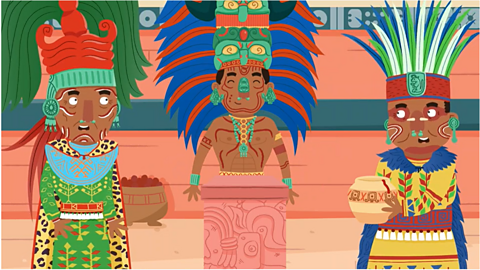 Animated image of Maya priests who are colourfully dressed and wearing very colourful headwear. 