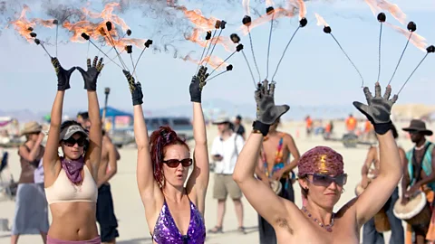 People attend the Burning Man festival (Credit: Getty Images)