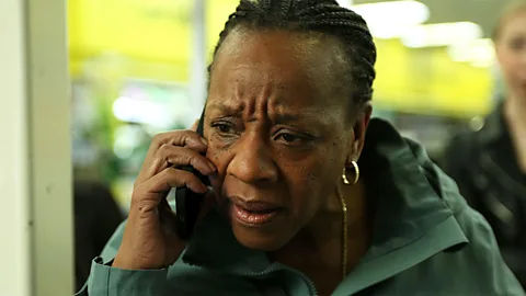 Marianne Jean-Baptiste in Hard Truths, pictured holding a phone to her ear (Credit: TIFF)