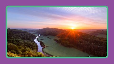 Sunrise over the horizon near the River Wye.