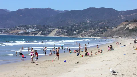 People on a California beach (Credit Getty Images)