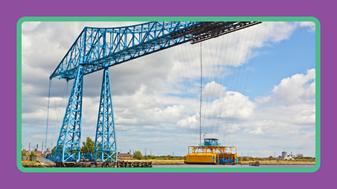 The Middlesbrough Transporter Bridge whilst lifting cars across the River Tees.