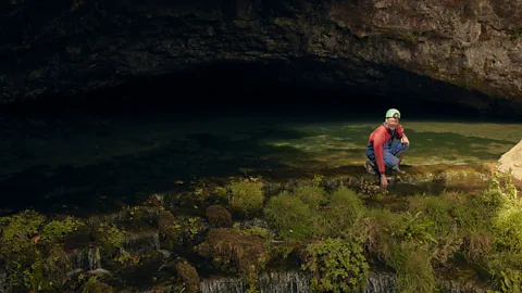 BBC Journalist, Katherine Latham, interviews caver, Phil Short, in Wookey Hole Cave (Credit: Fran Gomez de Villaboa)