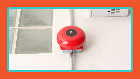 A fire alarm ringing.