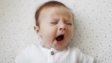 A baby yawning (Credit: Getty Images)