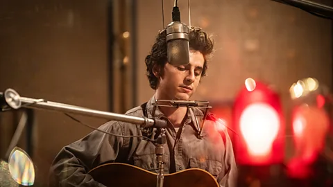 Timothée Chalamet starring as Bob Dylan in A Complete Unknown (Credit: Searchlight Pictures)