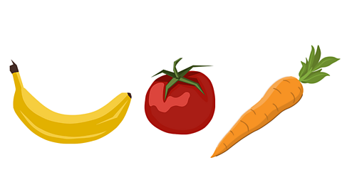 A banana, a tomato and a carrot