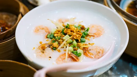 Close up of a bowl of Chinese congee with prawns (Credit: Getty Images)