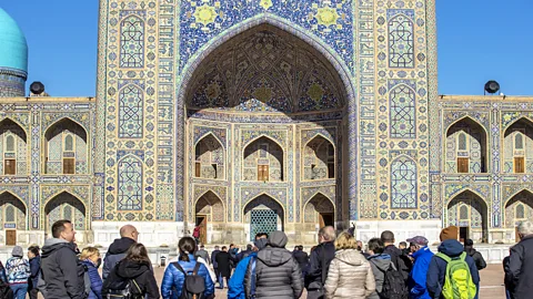 Crowd in front of Tilya-Kori Madrasah in Samarkand, Uzbekistan (Credit: Getty Images)