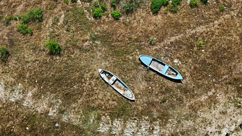 Boats in dry bed of Lake Marmara, Turkey (Credit: Getty Images)