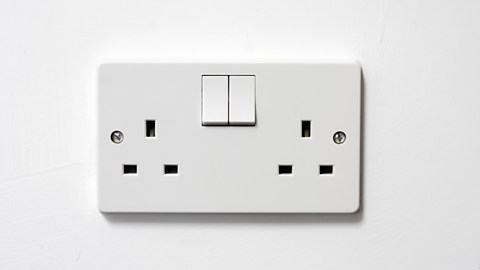 A white double UK socket