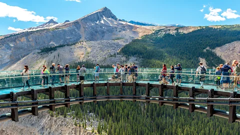 Tourists walking on Columbia Icefield Skywalk, Jasper National Park, Canada (Credit: Alamy)