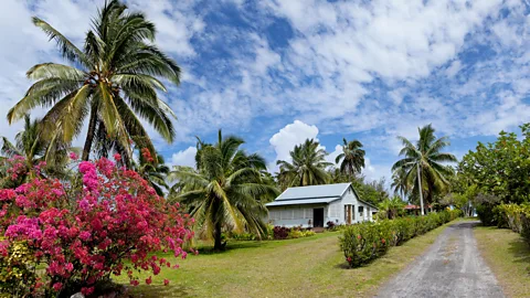 Blue sky over house on Rarotonga in the Cook Islands (Credit: Getty Images)