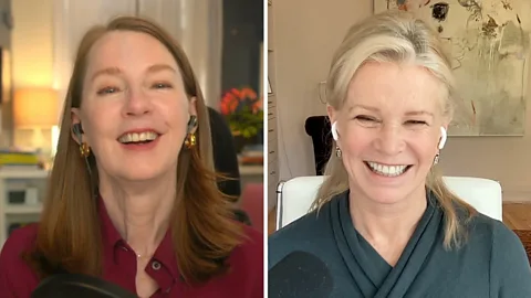 BBC Special Correspondent Katty Kay speaks to author Gretchen Rubin on a video call. Kay is shown from behind with white earbuds and a black microphone and she wears a green shirt. Rubin is shown on her monitor and can be seen wearing a dark red shirt and black earbuds (Credit: BBC)
