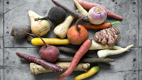 A selection of root vegetables – carrots, parsnips, rutabegas, ginger and beets (Credit: Getty Images)