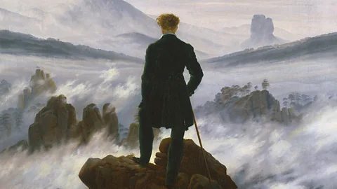 The painting Wanderer Above the Sea of Fog which shows the back of a man stood on the ledge of a rock with fog underneath and in the distance (c. 1817) (Credit: SHK/ Hamburger Kunsthalle/ bpk. Photo: Elke Walford)