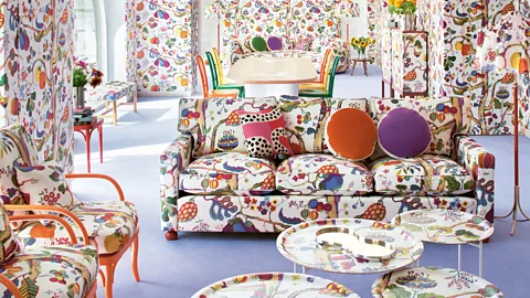 The interior of a living room which has been decorated with bright, patterned furniture (Credit: Courtesy of Svenskt Tenn archive)