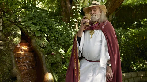 Rollo Maughfling, the Archdruid of Stonehenge, stands in front of Glastonbury Tor (Credit: Francisco Gomez de Villaboa)