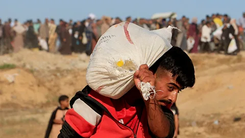 Newshour, Newshour, More Palestinians killed waiting for food