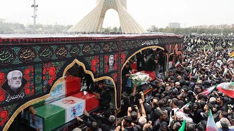 Newshour, Newshour, Iran holds state funeral for commanders and scientists