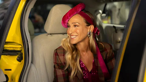 A still of Carrie Bradshaw in a cab from final episode of And Just Like That (Credit: HBO Max)