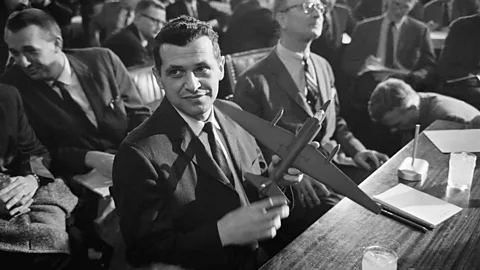 Francis Gary Powers holds a model airplane (Credit: Getty Images)