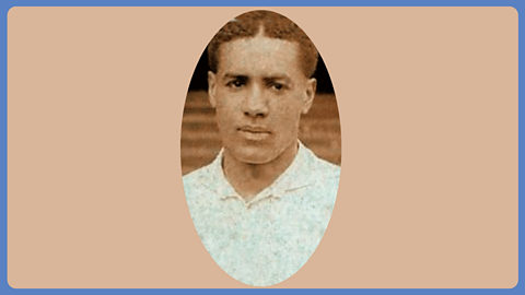 A sepia photograph of a young man in a white football shirt