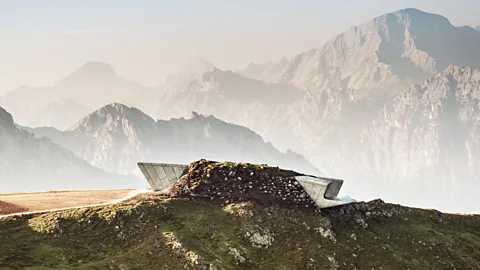 Concrete structure of the Messner Mountain Museum Corones on mountaintop with Dolomites in background (Credit: Messner Mountain Museums)