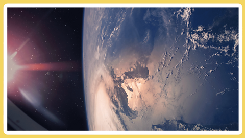 A close up of the surface of the Earth refelcting the Sun's glare to one side