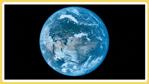 Planet Earth in the centre of a black background