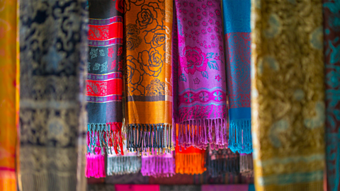 A photo of silk scarves on display in Indonesia.