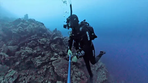 Diving through lava rock in the Canaries
