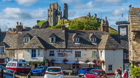 Heavy traffic in the popular tourist destination of Corfe Castle