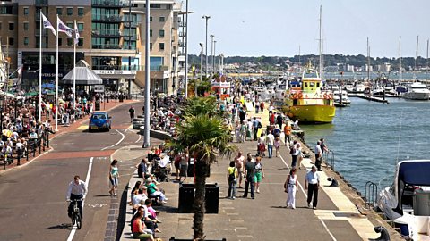 View of summer season crowds of people at Poole Harbour