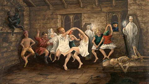 Colour illustration of witches and warlocks dancing in a ruined church (Credit: Getty Images)