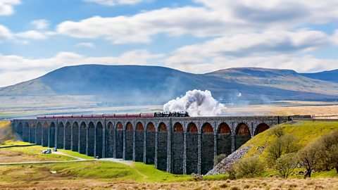 Steam train crossing the Ribblehead Viaduct, Yorkshire Dales