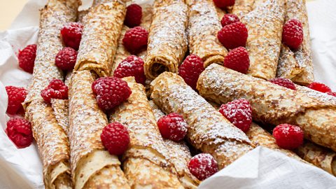 French crepes with chocolate and raspberries