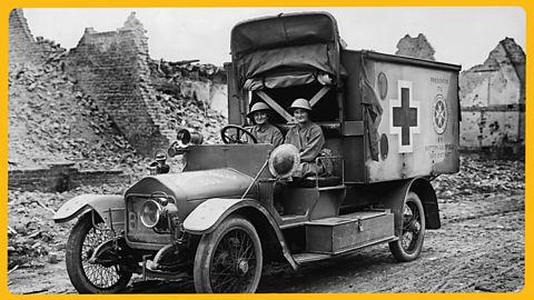 An old ambulance at the frontline with two women drivers