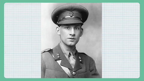 A black and white photograph of a young man's head and shoulders wearing a uniform and helmet