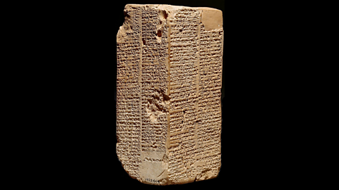 A clay tablet that makes up part of the Sumerian King List. It is covered in wedge-shaped marks, this ancient writing forms 4 columns.