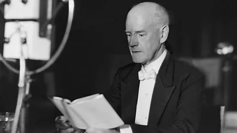 Galsworthy reading into microphone (Credit: Alamy)