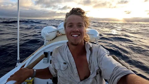 Outlook, Outlook, Alone in the Pacific on the upturned hull of my boat