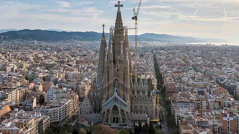 An aerial view of Sagrada Familia rising above the Barcelona skyline (Credit: Getty Images)