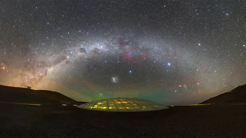 Two people look up at a starry night sky on the balconies at the Residencia in the Atacama Desert in Chile (Credit: Eso/ Luis Calçada/ Herbert Zodet)