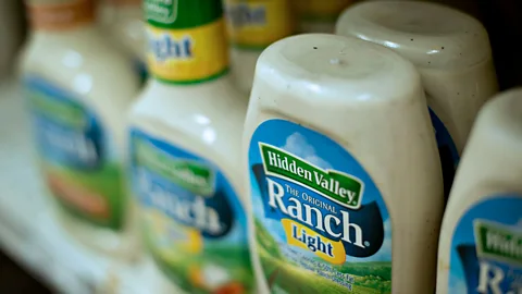 A closeup of bottles of Hidden Valley Ranch dressing on a supermarket shelf (Credit: Getty Images)
